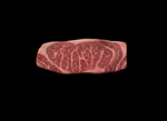Raw steak with marbling on a black background